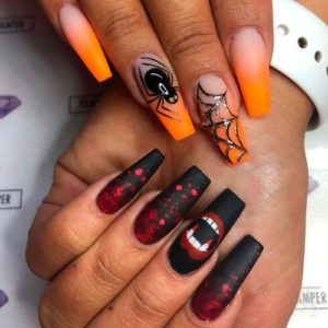 ​​How to create a simple black and orange Halloween nail design?