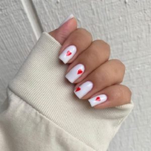 White Nails with Heart Design